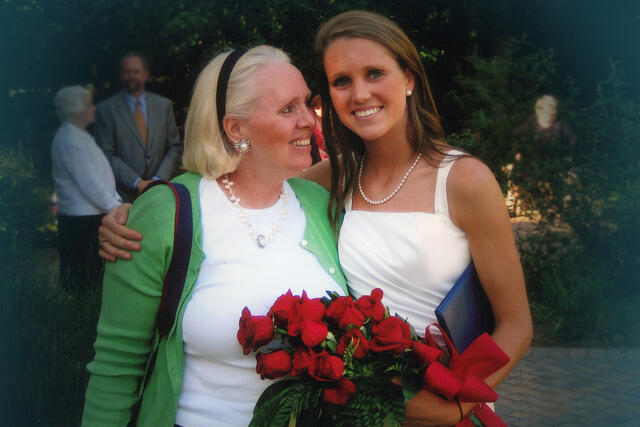 Alumna Sharon Love and daughter and Yeardley standing together. 