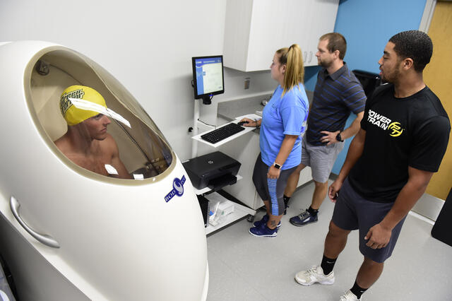 Student athlete using the Body Pod.