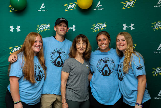 Linda Kephart with the four student planners.