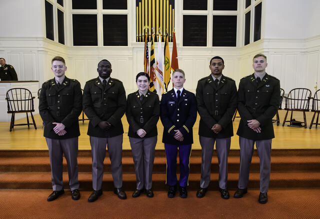 The six ROTC cadets pose together for a photo.