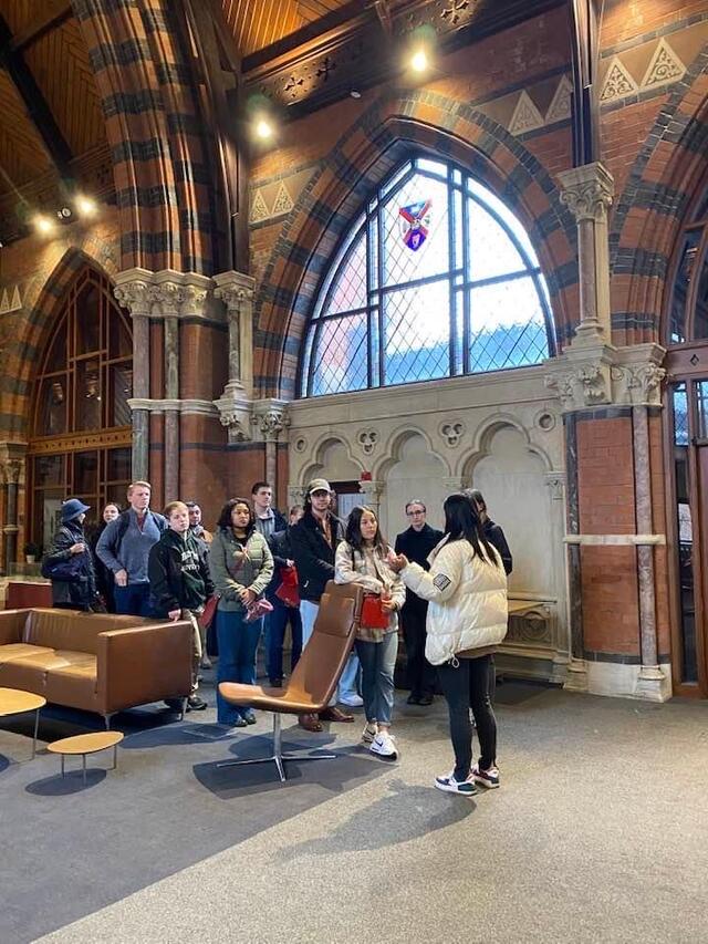 Students standing in a group in a building in Ireland 