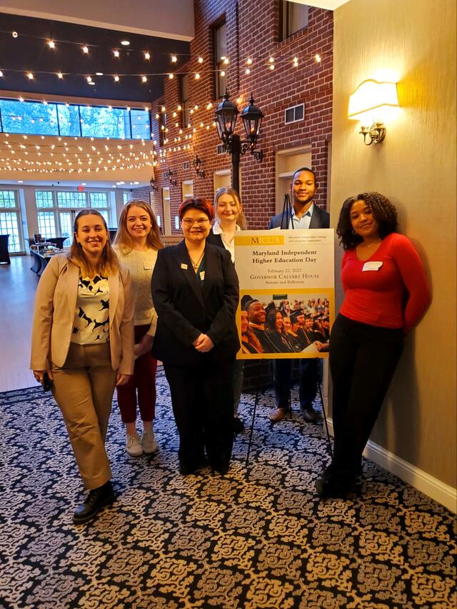 Students attend an event in professional clothing 