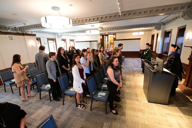 Students being inducted into Phi Beta Kappa.