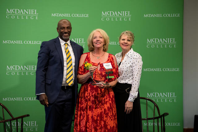 Alumni of the Year Corynne Courpas with President Jasken and Alumni Council President James Martin Alumni Awards Celebration Alumni Weekend 2023