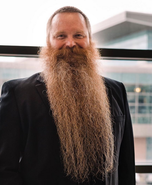 Photo of professor Brad Stoddard in a black jacket.