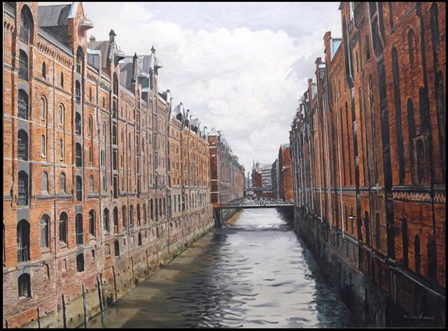 Old water canal with buildings on the sides. 