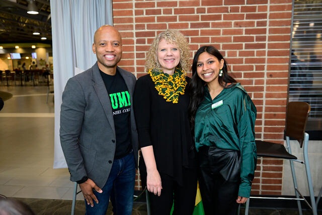 McDaniel President Jasken stands with Richard Smith and Alina Philip.