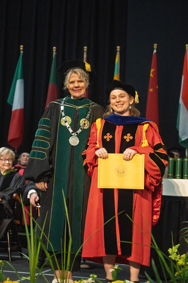 Jennifer McKenzie '01, recipient of the Ira G. Zepp Distinguished Teaching Award, poses with President Julia Jasken