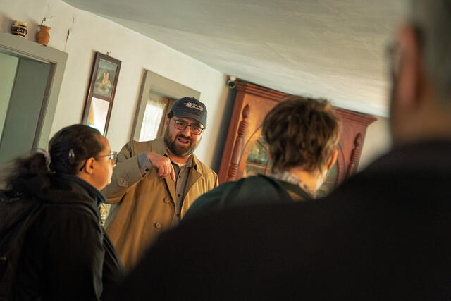 Union Mills Director Kyle Dalton speaks to a group of students.