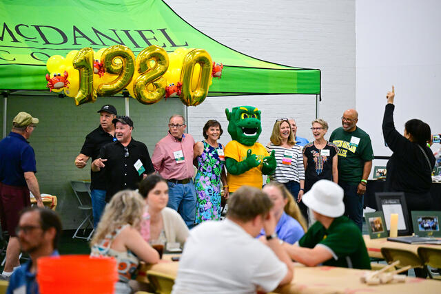 Class of 1980 assemble for their group photo.