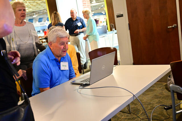 Members of the class of 1960 Zoom with classmates unable to travel back to the Hill.