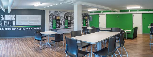 Panoramic View of Clubroom with one wall that has large letters reading "Enduring Strength"