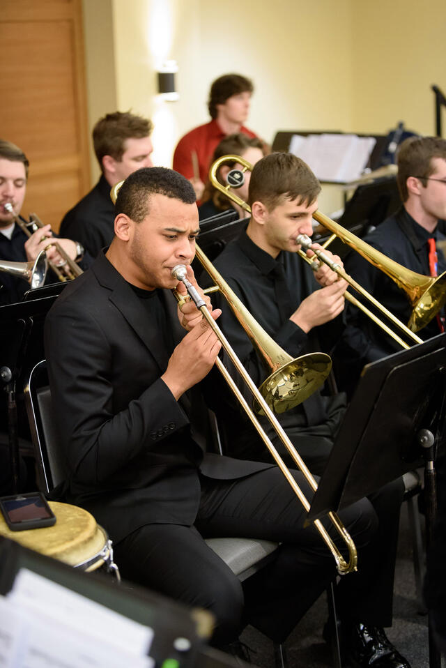 students play instruments in a jazz ensemble