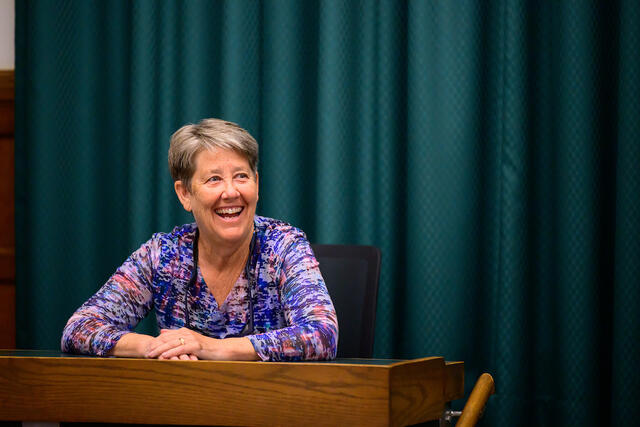 An alum listens intently at The Hill: Then & Now.