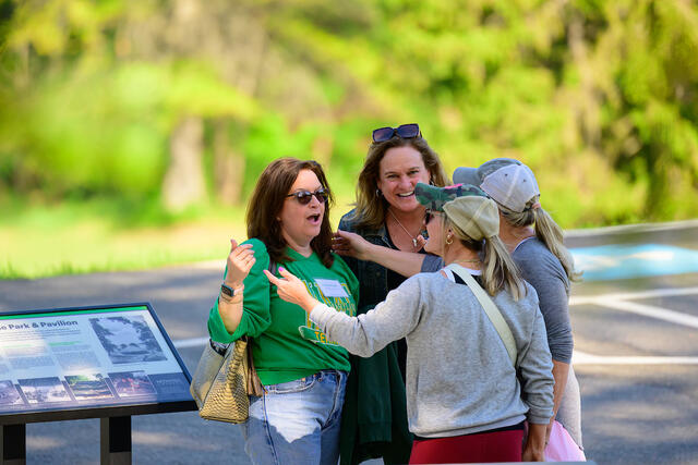 Alumni Weekend guests tour the renovated Harvey Stone Park. 