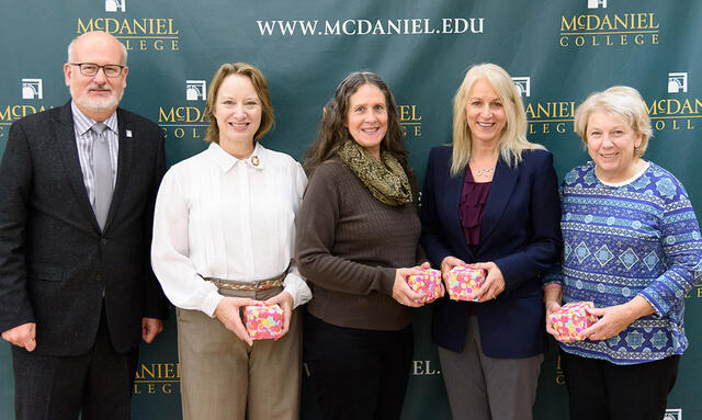 Photo of faculty and staff who have given 15 years of service to the college.