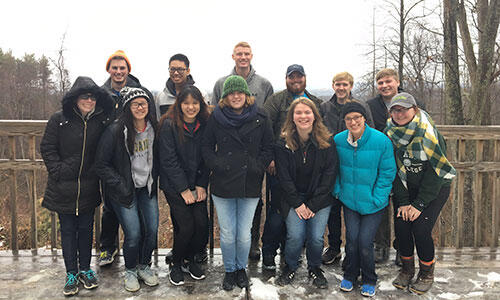 Student volunteers in McDowell, W. Va., (back row, l.-r.) Atticus Rice, Phuc Truong, Will Bower, Frank Kuhl, Jeb Shingler, Sam Hampton, (front row, l.-r.) Rebecca Minch, Maia Hanlon, Vi Lam, Liv Lauer, Jessie Wyatt, Dori Nance and Olivia Todd