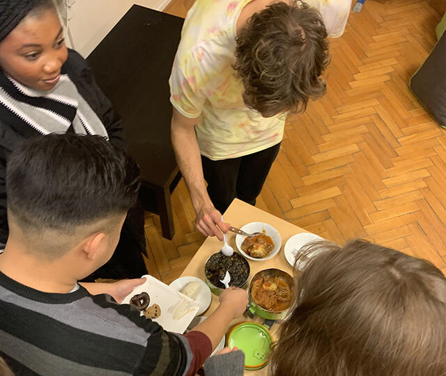 McDaniel Europe students sample Nigerian cuisine.