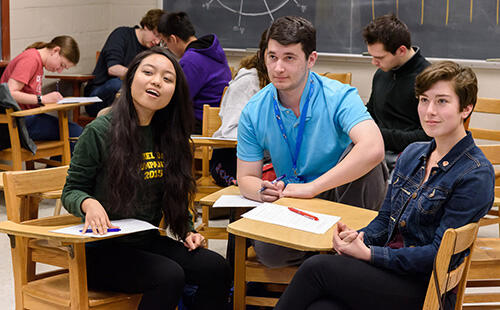 Second Place: The all-Math-majors team of Second Derivatives, Angel Tuong (l-r), Tim Banks and Darby Bortz, took second place in McDaniel's Estimathon.
