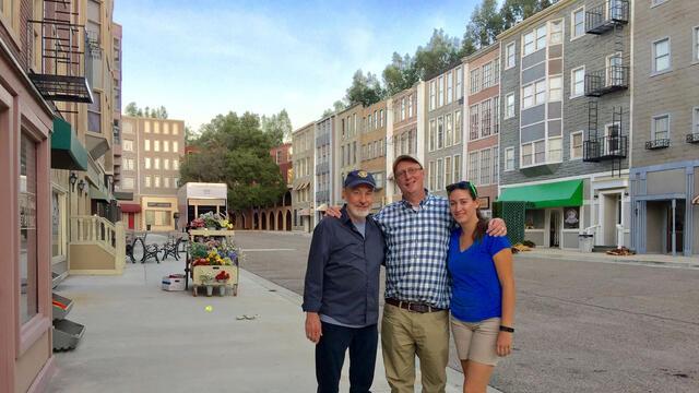 Hollywood producer Jim Wilberger ’72 (left) with his former intern and production assistant Tricia Meola ’15 (right) and Communication & Cinema professor Jonathan Slade ’88 (center) during a tour of his studio in L.A. in 2016.