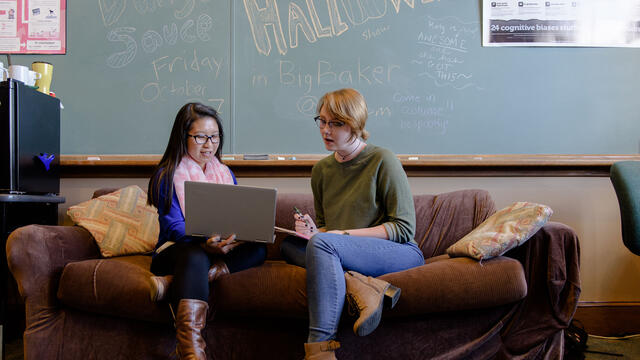 Students studying in lounge.