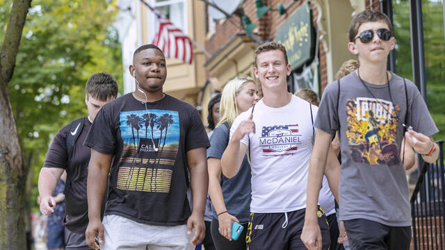 Students walking around downtown Westminster during McDaniel Local.