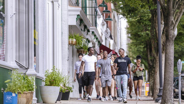 Students walking around downtown Westminster during McDaniel Local.