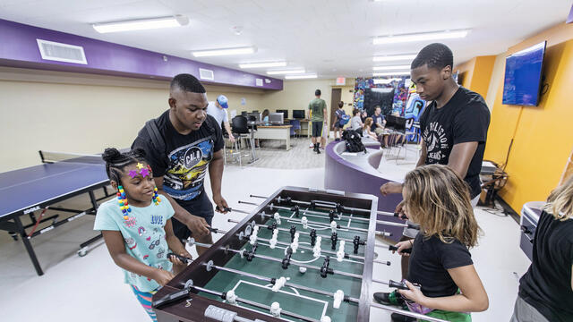 Students interacting with children at the Boys and Girls Club in Westminster.