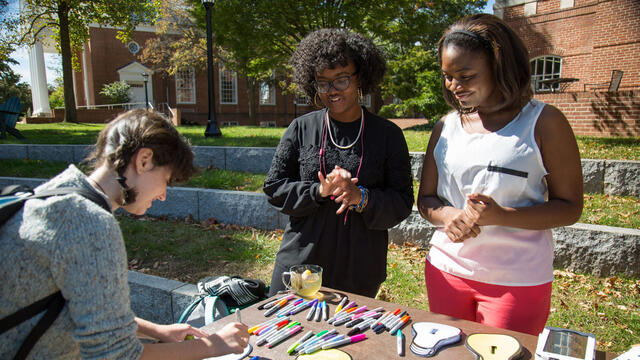 Students making Global Climate Change Week Light Switch Art