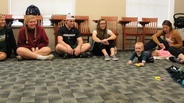 Baby interacting with a classroom full of Developmental Psychology students.