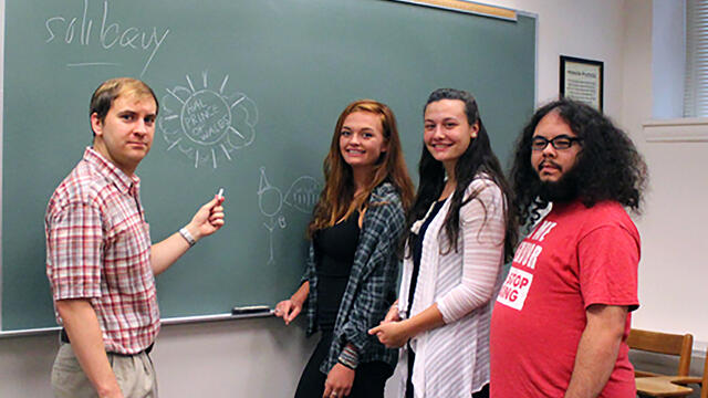 English professor Paul Zajac with student from his Shakespeare's Game of Thrones FYS