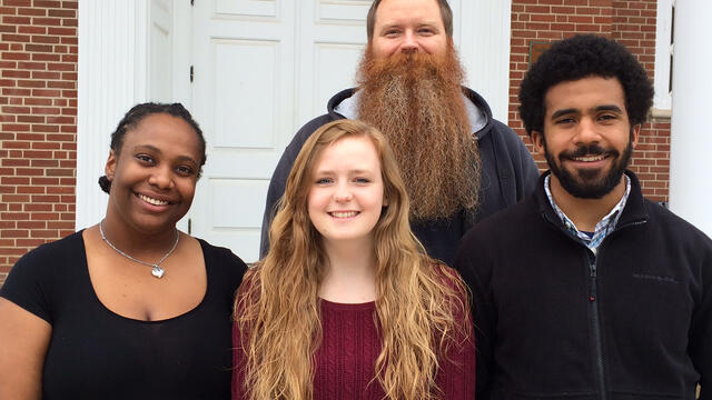 Religious Studies professor Brad Stoddard with students who presented on Religion and Race