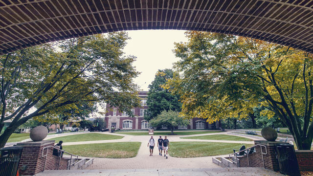 Students walking towards Hoover Library