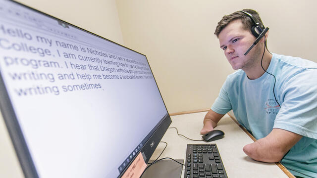 Student using dictation software.