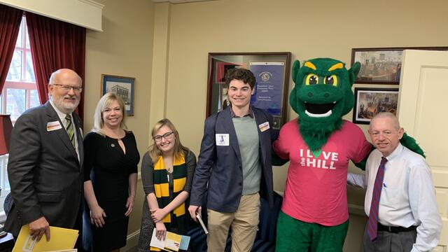 McDaniel College President Roger N. Casey with Maryland State Delegate April Rose, McDaniel students Kasey Reece and Maxwell Pardoe, the Green Terror and Maryland State Delegate Haven Shoemaker Jr.