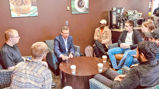 Students from the Writing for Nonprofit Organizations course visit with McDaniel College Board of Trustees member Mark Stuart, president and chief executive officer of The San Diego Foundation.