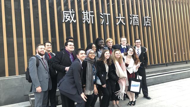 students pose at Model United Nations in China