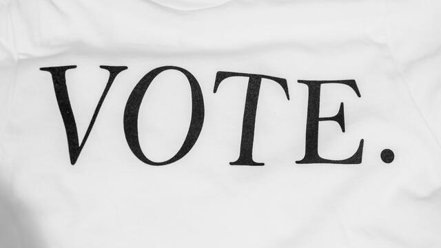 The word vote against white background