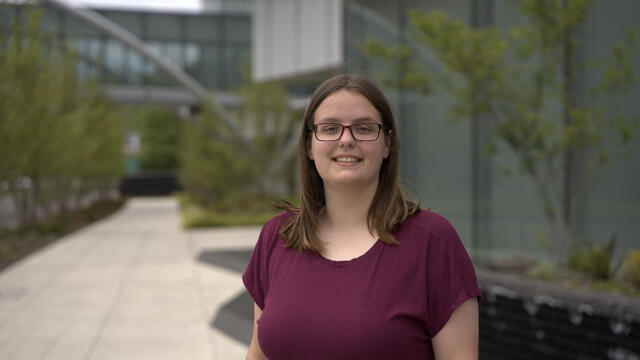 Photo of alum Kaitlyn Bowser standing outside.