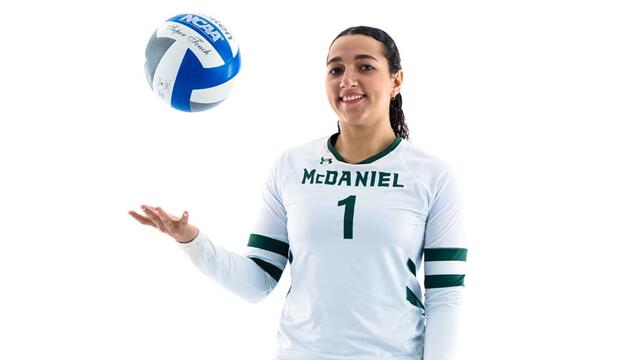 Katherine Taveras tossing a soccer ball