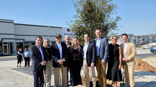 Brett Foelber with his St. John Properties colleagues.
