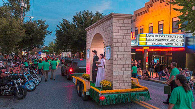 Photo of McDaniel College's float featuring the Arch in Westminster's FallFest Parade