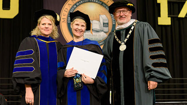 Julia Jasken, Deb Miller, President Roger Casey