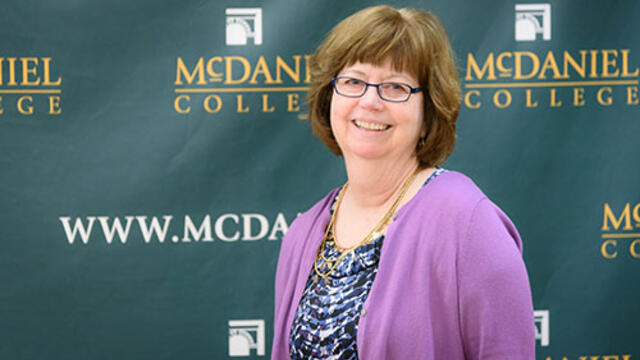 Photo of English professor Kathy Mangan recognized for 40 years of service to McDaniel College