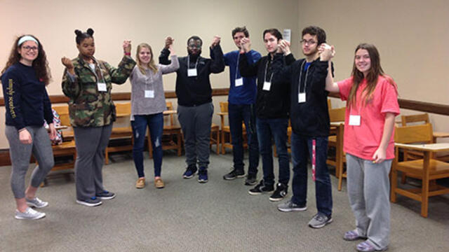McDaniel College students in Priciples of Biology class form a human chain of amino acids to learn about proteins