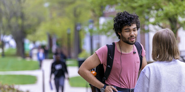 Students in conversation on campus.