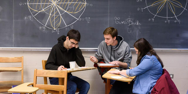 Students sitting at classroom desks during Estimathon.