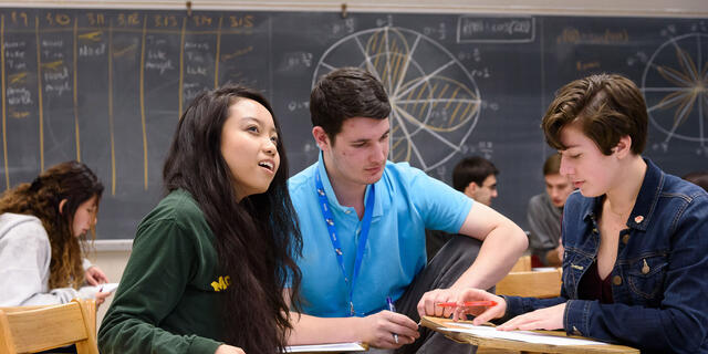 Students sitting at classroom desks during Estimathon.