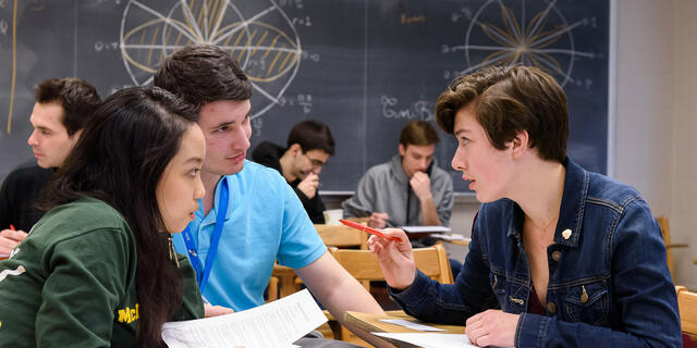 Students sitting at classroom desks during Estimathon.