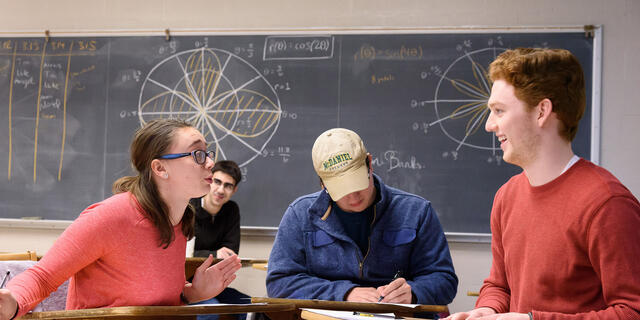 Students sitting at classroom desks during Estimathon.